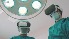 Surgeons wearing VR headsets