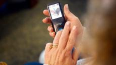 A close up of a woman using the POGO system