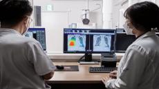 Radiologists checking an X-ray analysis from Lunit INSIGHT CXR