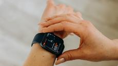 A person checking their vitals on a smartwatch