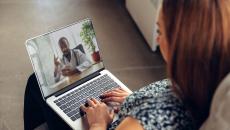 Person on a telehealth call on their laptop