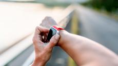 A person's arm with a smartwatch on their wrist