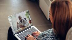 Person talking with provider on laptop 